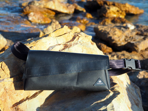The mimycri bag Small Fanny Pack on front stones