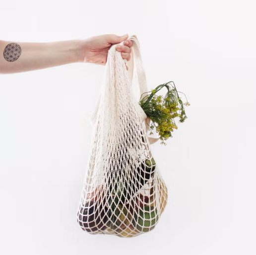 A net bag with fruits and vegetables